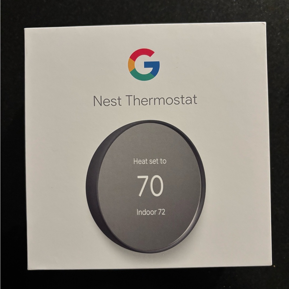 Google Nest thermostat. Charcoal. New, sealed.